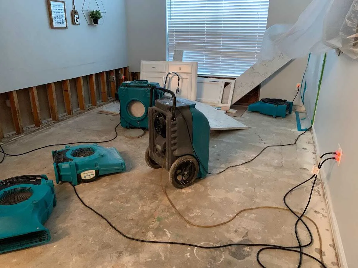 Dehumidifier in flood-cut room for Water Damage Restoration in August